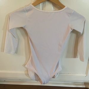 Long sleeved white Yumiko leotard. This Leo is gorgeous-  an absolute favorite.
